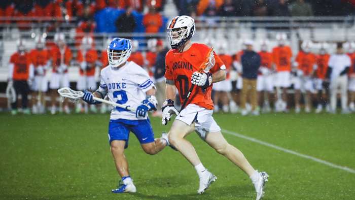 Evan Zinn runs down the field during the Virginia men's lacrosse game against Duke at Klockner Stadium.